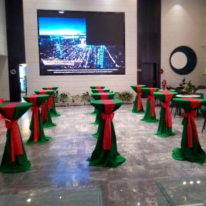 Cocktail table with Green cover and red ribbon x-mas theme