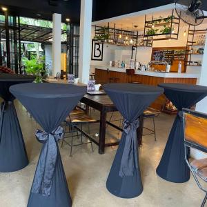 Cocktail table with black cover and black ribbon